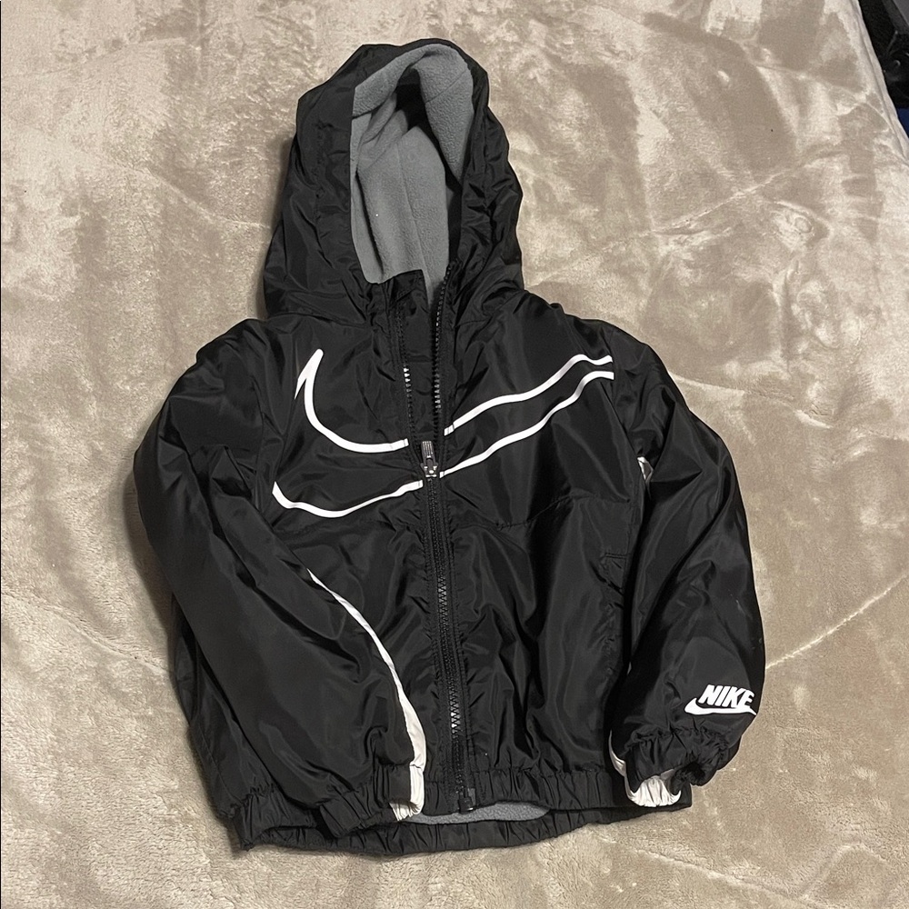 Nike Kids Black Hooded Rain Jacket with White Accents